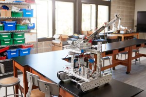 classroom with science class tools and material on desk