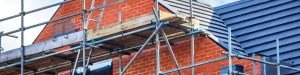 Scaffolding beside new home during construction