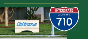 Front of building CalTrans sign with an Interstate 710 graphic